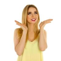 girl in yellow t-shirt posing in studio photo