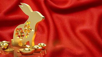 The gold rabbit and vintage Chinese money on red background  3d rendering photo