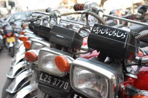 Motorcycles parked in line photo