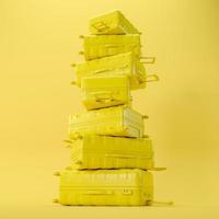 A stack of yellow travel suitcases on a yellow background. 3D rendering illustration. photo