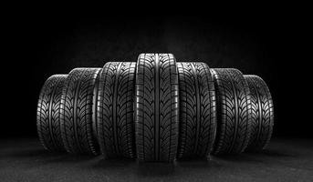 Seven car wheels on black background. Poster or cover design. 3D rendering illustration. photo