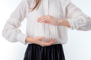 girl pulled her hands and holds them one opposite the other photo