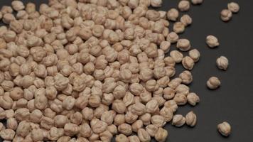 Dry chickpeas legumes uncooked rotating, Mediterranean diet healthy nutrition vegetarian or vegan video