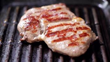 Grilling beaf steak. Cooking  meat. Delicious food preparation. video