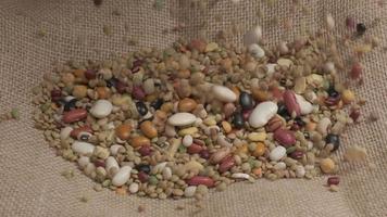 Mixed legumes soup beans falling, organic agriculture, healthy diet and vegetarian nutrition video