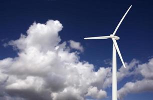 Wind Turbine Over Dramatic Sky and Clouds photo