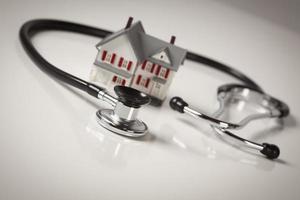 Stethoscope with Small Model Home photo