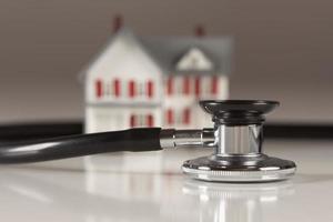 Stethoscope with Small Model Home photo