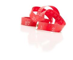 Red Measuring Tape on White photo