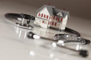 Stethoscope with Small Model Home photo