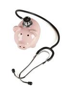 Piggy Bank and Stethoscope Isolated with Slight Shadow photo