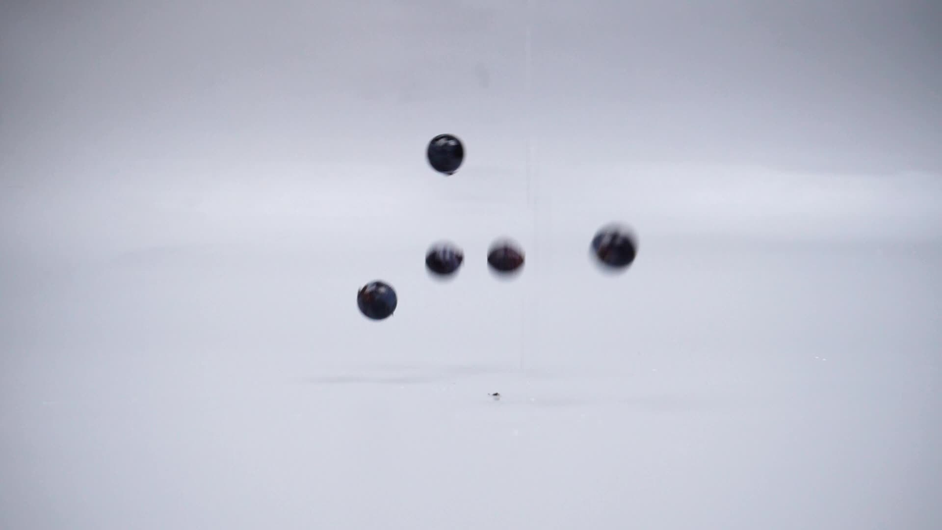 falling fresh grapes on gray background 16355423 Stock Video at Vecteezy