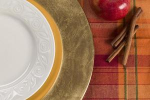 Abstract Table Setting of Apple and Cinnamon with Plate photo