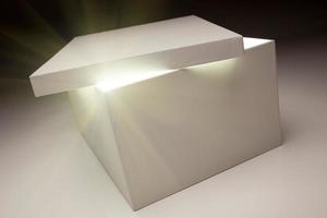 White Box with Lid Revealing Something Very Bright photo