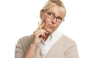 Thinking Woman with Pencil Looking Up and to the Left photo