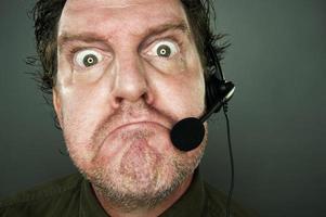 Grumpy Customer Support Man with Headset photo