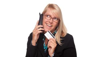 Beautiful Blonde Woman with Phone and Credit Card photo