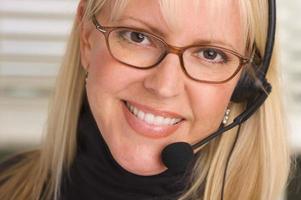 Attractive Businesswoman with Phone Headset photo