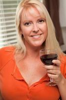 Attractive Blond with a Glass of Wine photo