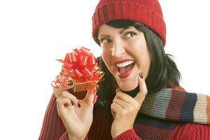 Happy Woman Holding Christmas Gift on White photo