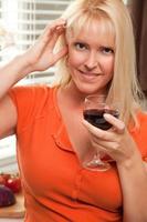 Attractive Blond with a Glass of Wine photo