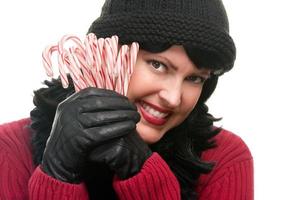 Pretty Woman Holding Candy Canes photo