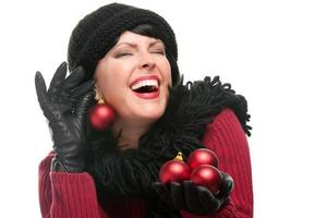 Attractive Woman Holding Christmas Ornaments photo