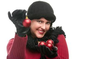 Attractive Woman Holding Christmas Ornaments photo