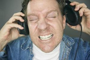 Shocked Man Wearing Headphones photo