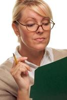 Beautiful Woman with Pencil and Folder photo