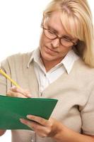 Beautiful Woman with Pencil and Folder photo