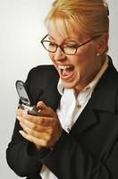 Businesswoman using her cell phone. photo