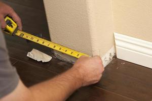 Measuring for New Baseboard with Bull Nose Corners and New Laminate Flooring photo