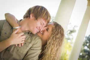 Attractive Loving Couple Portrait in the Park photo