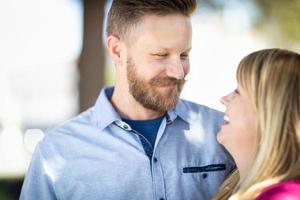 Young Adult Caucasian Couple Portrait At The Park photo