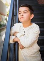 Portrait of Mixed Race Young Hispanic and Caucasian Boy photo