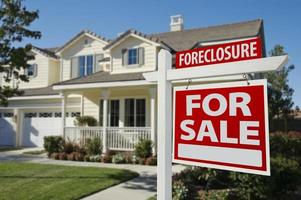 Foreclosure Home For Sale Sign and House photo