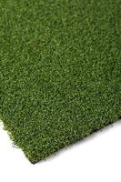 Section of Artificial Turf Grass On White Background photo