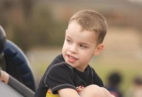 Adorable Child Playing at the Playground photo