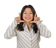 Attractive Multiethnic Woman with Hands Framing Face photo