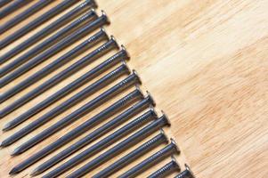Macro of Nails on Wood photo