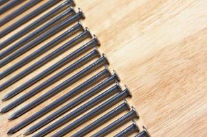 Macro of Nails on Wood photo