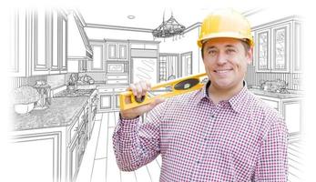 Contractor in Hard Hat with Level Over Custom Kitchen Drawing photo