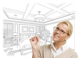 Woman With Pencil Over Custom Bedroom Design Drawing photo