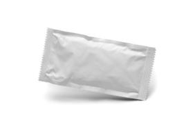 Blank White Condiment Packet Floating Isolated on White Background photo