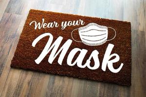 Wear Your Mask Welcome Door Mat on Wood Floor photo