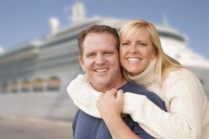 Young Happy Couple In Front of Cruise Ship photo