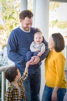 Young Mixed Race Chinese and Caucasian Family Portrait photo