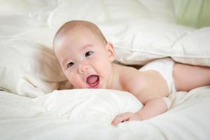 Mixed Race Baby Boy Having Fun on His Blanket photo