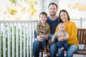 Young Mixed Race Chinese and Caucasian Family Portrait photo